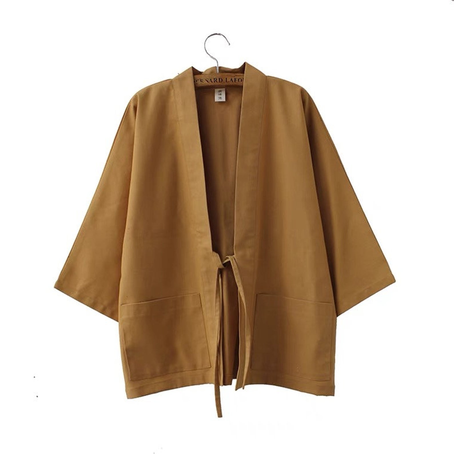 https://www.foxtume.com/cdn/shop/products/khaki-traditional-japanese-style-womens-kimono-jacket-haori.jpg?v=1622048042